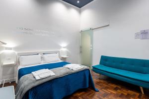Posteľ alebo postele v izbe v ubytovaní Skyhouse Duomo