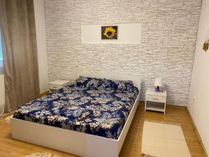 En eller flere senge i et værelse på Casa Nich