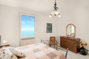 Postel nebo postele na pokoji v ubytování Casa Fuori di Mare