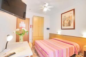 TV a/nebo společenská místnost v ubytování Hotel Itta + 29 fotografií