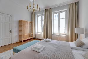 Posteľ alebo postele v izbe v ubytovaní BLUE MANDARIN Premium II