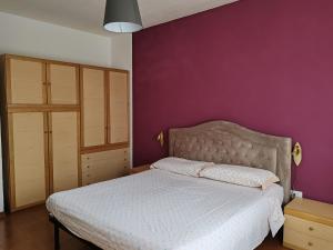 Postel nebo postele na pokoji v ubytování La Rondinella