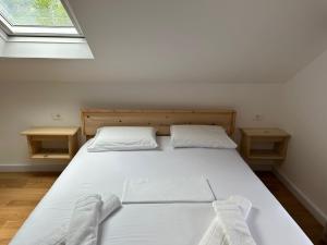 Letto o letti in una camera di Ferma e bleteve Stomici