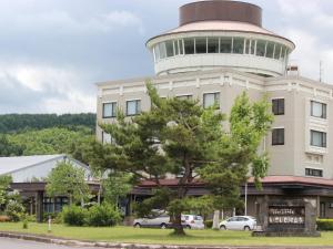 a building with a control tower on top of it at Ikoinomura Iwate in Hachimantai