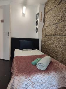 Giường trong phòng chung tại Casa Augusta AL