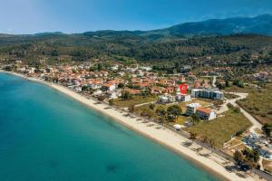 an aerial view of a resort on a beach at Villas THALLO in Paradisos