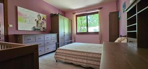 Postel nebo postele na pokoji v ubytování Apartmán U jezírka - Relax v Chřibech - Kroměříž - Kostelany