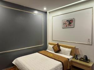 Ένα ή περισσότερα κρεβάτια σε δωμάτιο στο Hương Quê - 7 Ngõ Ga, Phú Lương, Hà Đông - by Bay Hostel