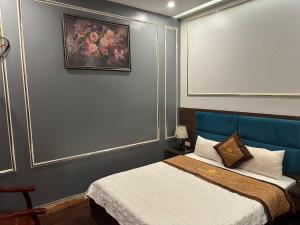 Ένα ή περισσότερα κρεβάτια σε δωμάτιο στο Hương Quê - 7 Ngõ Ga, Phú Lương, Hà Đông - by Bay Hostel