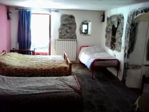 Postel nebo postele na pokoji v ubytování Il Borgo della Colomba