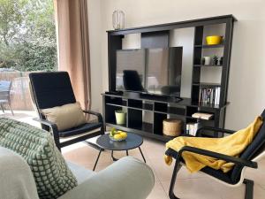 Μια τηλεόραση ή/και κέντρο ψυχαγωγίας στο Maison proche des plages