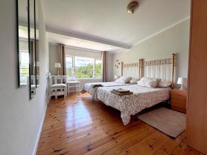 Ένα ή περισσότερα κρεβάτια σε δωμάτιο στο Casa Catanea