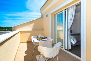 Rõdu või terrass majutusasutuses Guest Accommodation Atrium Gulin