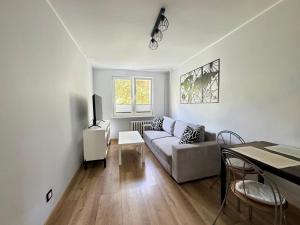 Posezení v ubytování Redłowska Przystań - Plaża, Las, Miasto, Fiesta Apartments