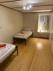 Postel nebo postele na pokoji v ubytování Ferientraum direkt am Thunersee