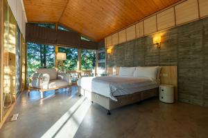 Postel nebo postele na pokoji v ubytování Chuying Sunrise B&B