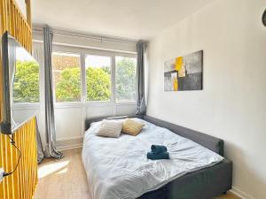 Postel nebo postele na pokoji v ubytování Appartement élégant et cosy - 4Pers