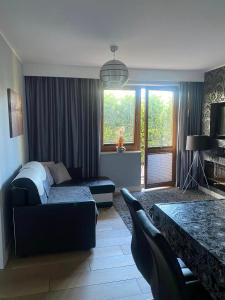 Χώρος καθιστικού στο Apartament Wiktoria