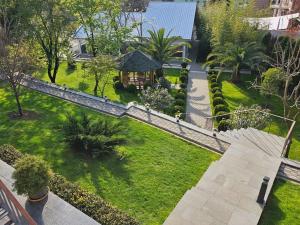 an aerial view of a garden with a gazebo at Retro Villa in Batumi