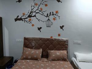 Postel nebo postele na pokoji v ubytování Atithi home stay