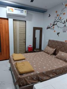 Postel nebo postele na pokoji v ubytování Atithi home stay