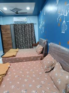 Postel nebo postele na pokoji v ubytování Atithi home stay