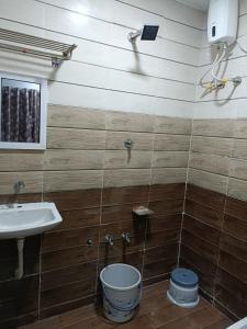 Koupelna v ubytování Atithi home stay