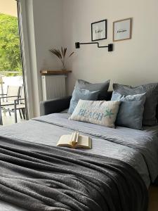Ένα ή περισσότερα κρεβάτια σε δωμάτιο στο Apartament Sun