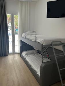 Postel nebo postele na pokoji v ubytování Hotel President