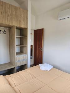 Un pat sau paturi într-o cameră la Casa5