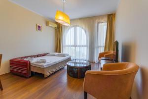 Postel nebo postele na pokoji v ubytování Apart Hotel Golden Line