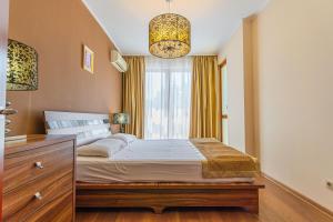 Postel nebo postele na pokoji v ubytování Apart Hotel Golden Line