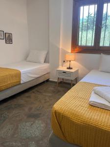 Postel nebo postele na pokoji v ubytování ZeusPlace Olympus Olive Country House 1 ground floor