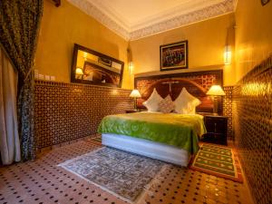 Postel nebo postele na pokoji v ubytování Clé De Sol Riad & SPA