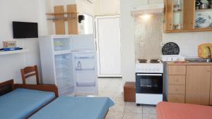 A kitchen or kitchenette at Agapi Apartments