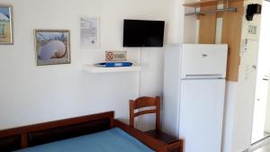 A kitchen or kitchenette at Agapi Apartments