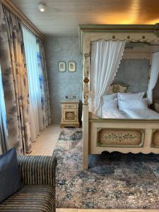 Postel nebo postele na pokoji v ubytování Hotel Fohlenhof