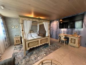 Postel nebo postele na pokoji v ubytování Hotel Fohlenhof