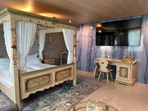 Postel nebo postele na pokoji v ubytování Hotel Fohlenhof + 37 fotografií
