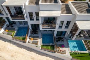 an aerial view of a villa on the beach at Pearl of Thassos in Skala Potamias