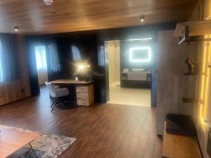 Kuchyň nebo kuchyňský kout v ubytování Hotel Fohlenhof