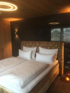 Postel nebo postele na pokoji v ubytování Hotel Fohlenhof
