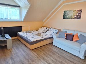 Posteľ alebo postele v izbe v ubytovaní Sylvia Apartman