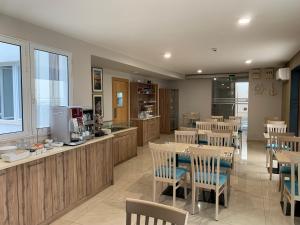 Η κουζίνα ή μικρή κουζίνα στο Duncan Guesthouse