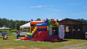 a childs play equipment in a park at Tūjas dīķi in Tūja