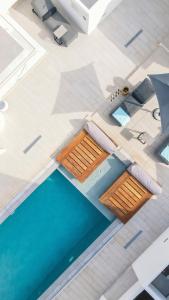 The swimming pool at or close to Quartano Luxury Cycladic Residence, Adults Only (13+)