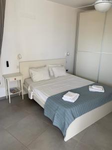 Postel nebo postele na pokoji v ubytování Casa Vacanze Baciata