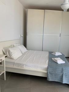 Postel nebo postele na pokoji v ubytování Casa Vacanze Baciata