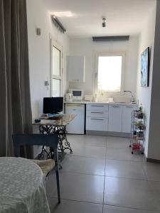 Kuchyň nebo kuchyňský kout v ubytování Casa Vacanze Baciata