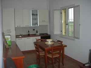 Kuchyň nebo kuchyňský kout v ubytování Tenuta Traversa